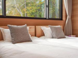 Postel nebo postele na pokoji v ubytování hirafu3 Near Niseko Resort Cozy Apt for 6PPL