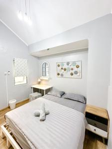 Postel nebo postele na pokoji v ubytování Otu Hostel By Ostic + 37 fotografií