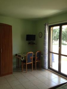 TV a/nebo společenská místnost v ubytování Apartments Villa Kristina
