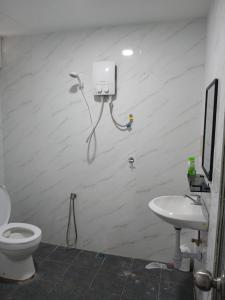 Koupelna v ubytování Enviropath Hotel