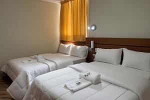 Ένα ή περισσότερα κρεβάτια σε δωμάτιο στο Rey Palace Hotel +16 φωτογραφίες