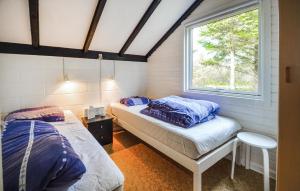 Postel nebo postele na pokoji v ubytování Two-Bedroom Holiday Home In Thisted