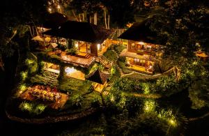 an aerial view of a house at night at Chivit Thamma Da Mountain Home in Mae Chan +61 photos