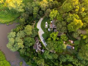 an aerial view of a park next to a river at Chivit Thamma Da Mountain Home in Mae Chan