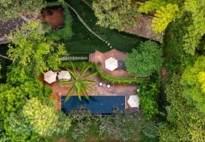an overhead view of a garden with a pool at Chivit Thamma Da Mountain Home in Mae Chan