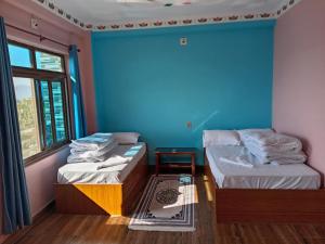 Postel nebo postele na pokoji v ubytování Sunshine homestay