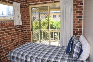 Ένα ή περισσότερα κρεβάτια σε δωμάτιο στο Birchgrove Terrace 1 - Bring your own linen