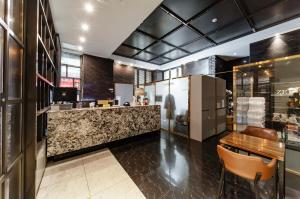 Kuchyň nebo kuchyňský kout v ubytování Zenith Hotel Bupyeong
