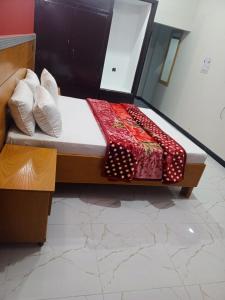 Postel nebo postele na pokoji v ubytování Hotel Al badar