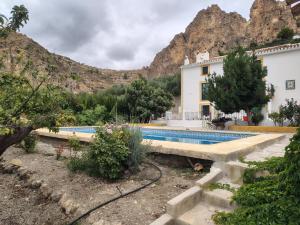 Piscina de la sau aproape de Casa rural en Castril - HUERTA MARTIN - Escapada con Piscina en Sierra de Castril -