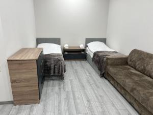 Postel nebo postele na pokoji v ubytování Bank Hotel