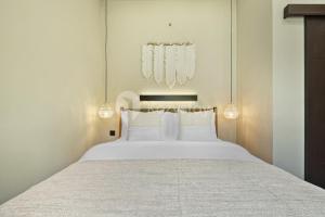 Giường trong phòng chung tại Aila Villa by Kozystay - Nusa Dua +31 ảnh