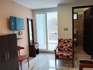 Fotografija v galeriji nastanitve Ponmurugan Residency v mestu Kodaikānāl