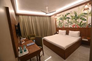 RNS Residency Sea View客房内的一张或多张床位