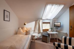 Letto o letti in una camera di Gästehaus Kopp