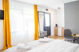 Postel nebo postele na pokoji v ubytování Tiny Houses Transfagarasan
