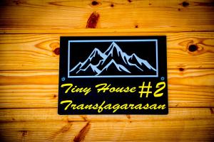 Certifikát, hodnocení, plakát nebo jiný dokument vystavený v ubytování Tiny Houses Transfagarasan