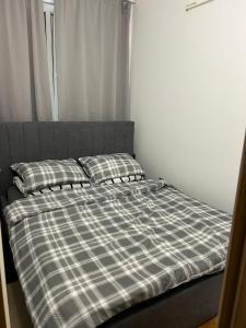 Postel nebo postele na pokoji v ubytování Apartment Adrian