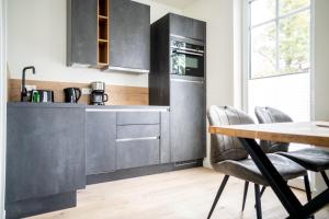 Kuchyň nebo kuchyňský kout v ubytování Strandhaus Zingst Apartment 06