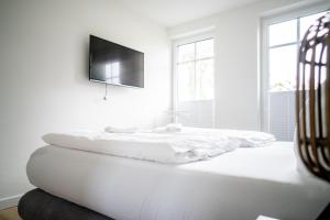 Postel nebo postele na pokoji v ubytování Strandhaus Zingst Apartment 06