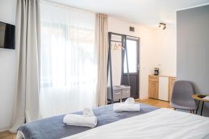 Postel nebo postele na pokoji v ubytování Tiny Houses Transfagarasan