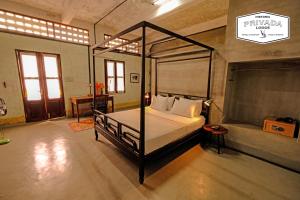 Privada Lodge - Historic Hotel客房内的一张或多张床位