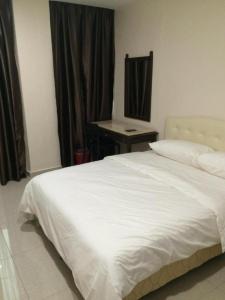 Katil atau katil-katil dalam bilik di Sam Hotel