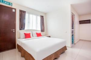 Katil atau katil-katil dalam bilik di Sam Hotel