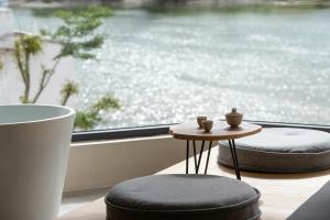 Kuvagallerian kuva majoituspaikasta 云渡雪山湖景民宿 Vento Snow Mountain Lake View B&B, joka sijaitsee kohteessa Lijiang
