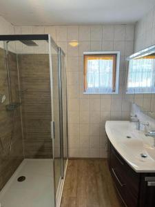Koupelna v ubytování Reichenspitzblick Appartement + 21 fotografií