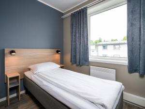 Postel nebo postele na pokoji v ubytování Comfort Hotel Finnsnes