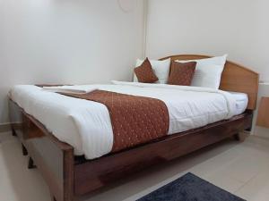 Letto o letti in una camera di SM Residency