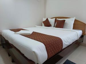 Letto o letti in una camera di SM Residency