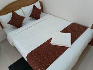 Letto o letti in una camera di SM Residency