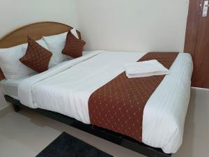 Letto o letti in una camera di SM Residency