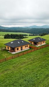 an aerial view of a house in a field at North Resorts Lucas in Novoť