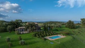 an aerial view of a house with a swimming pool at VILLA DEI ROSMARINI 8, Emma Villas in Orvieto