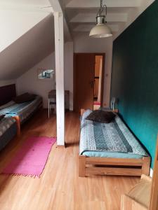 Postel nebo postele na pokoji v ubytování Wymój Park + 40 fotografií