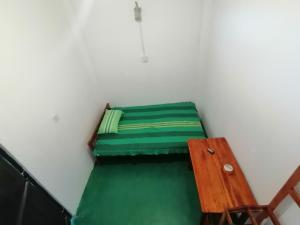 Postel nebo postele na pokoji v ubytování Ella Mountain Inn