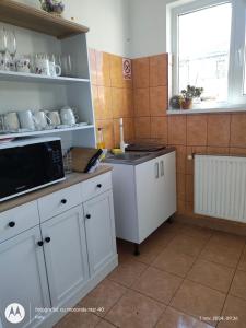 Kuchyň nebo kuchyňský kout v ubytování Casa Zura