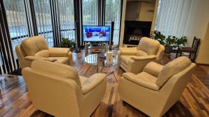 TV a/nebo společenská místnost v ubytování Narva-Jõesuu Beach Residence
