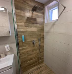 Koupelna v ubytování Vimar Apartments