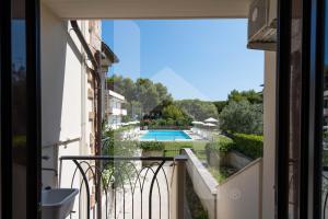 The swimming pool at or close to Homiday - Residence Micaene