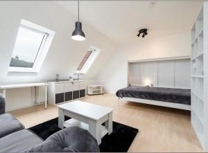 Ένα ή περισσότερα κρεβάτια σε δωμάτιο στο Modern mit schönem Ausblick