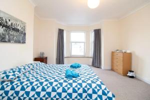 Ένα ή περισσότερα κρεβάτια σε δωμάτιο στο Darwin road guest house room 2