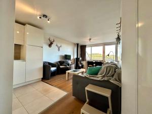 Χώρος καθιστικού στο Duplex Nice View