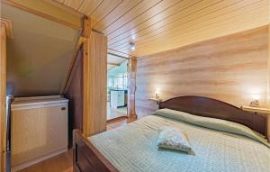 Posteľ alebo postele v izbe v ubytovaní Three-Bedroom Holiday Home In Valtura