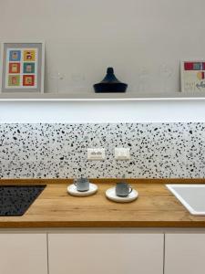 Kuchyň nebo kuchyňský kout v ubytování Civico 21 living - Tuscan loft + 31 fotografií