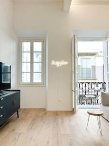 TV a/nebo společenská místnost v ubytování Civico 21 living - Tuscan loft