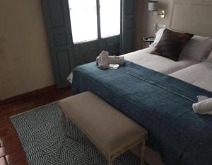 Posteľ alebo postele v izbe v ubytovaní Casa Boutique La Pila del Pato